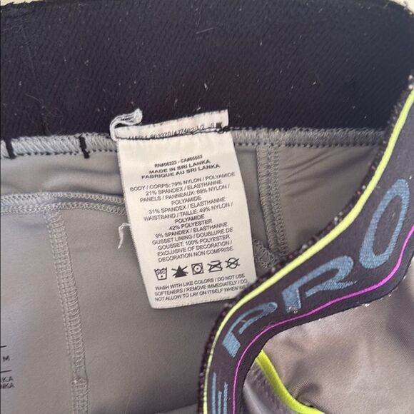 Nike Pro Gray Shorts with Neon and Purple Accents - Picture 3 of 4